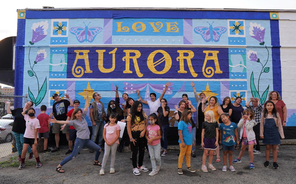 collaborative mural art painting creates city pride